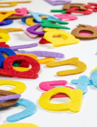  felt colorful alphabet letters scattered randomly